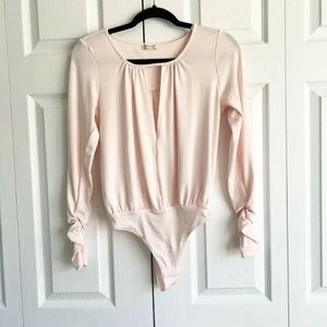 Free people NWT kaya bodysuit pink womens size small